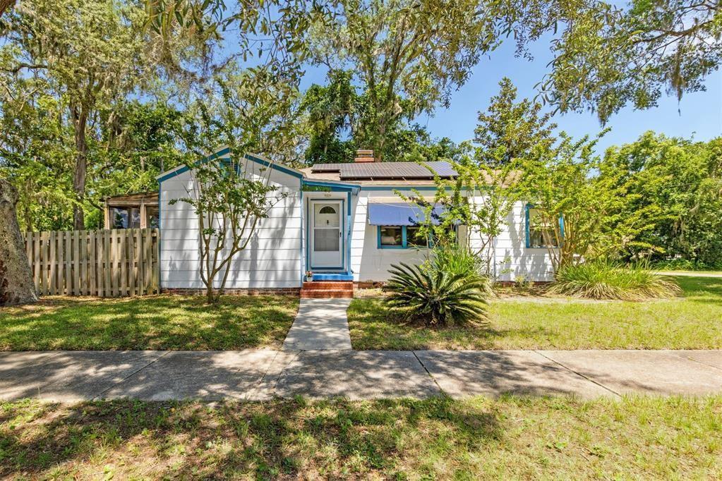 Location is Everything! Welcome to this adorable cottage, nestled under a canopy of beautiful trees in the heart of Amelia Island. Features: owned solar panels, transferable Alpha Foundation, new fencing and AC. The one-car garage adds even more possibilities—use it for parking, storage, or convert it into additional living space. Short walk/drive/ ride to beaches, boutique shopping, dining, trails, parks and schools! This versatile property is a good choice for a full time residence, vacation home or 30 day+ rental. Best of all, there’s no HOA, giving you the freedom to make this home truly your own. Eligible for $10K Regions Bank Grant! Located in a Low-to-Moderate Income (LMI) area no income limits for qualified first-time buyers. Use towards down payment or closing cost!