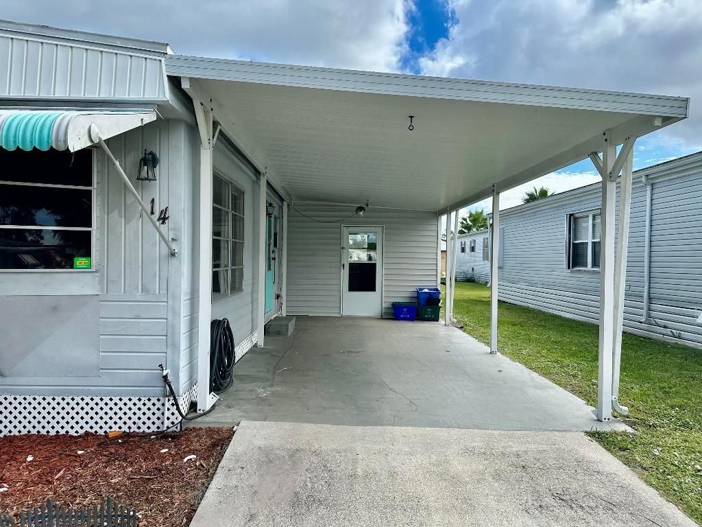 Photo of 14 S Granada Lane, Port Saint Lucie, FL 34952 (MLS # R10932557)