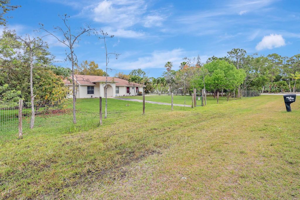 Photo of 12021 61st Street N, West Palm Beach, FL 33412 (MLS # R11066612)