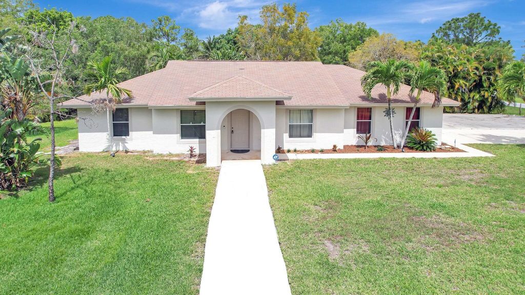 Photo of 12021 61st Street N, West Palm Beach, FL 33412 (MLS # R11066612)