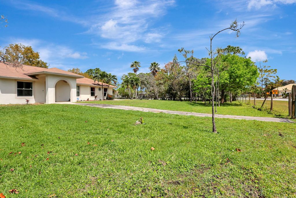 Photo of 12021 61st Street N, West Palm Beach, FL 33412 (MLS # R11066612)