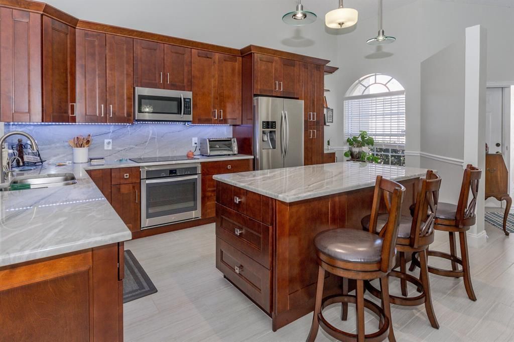 Photo of 2731 Quaking Leaf Lane Ln, Boynton Beach, FL 33436 (MLS # R10829285)