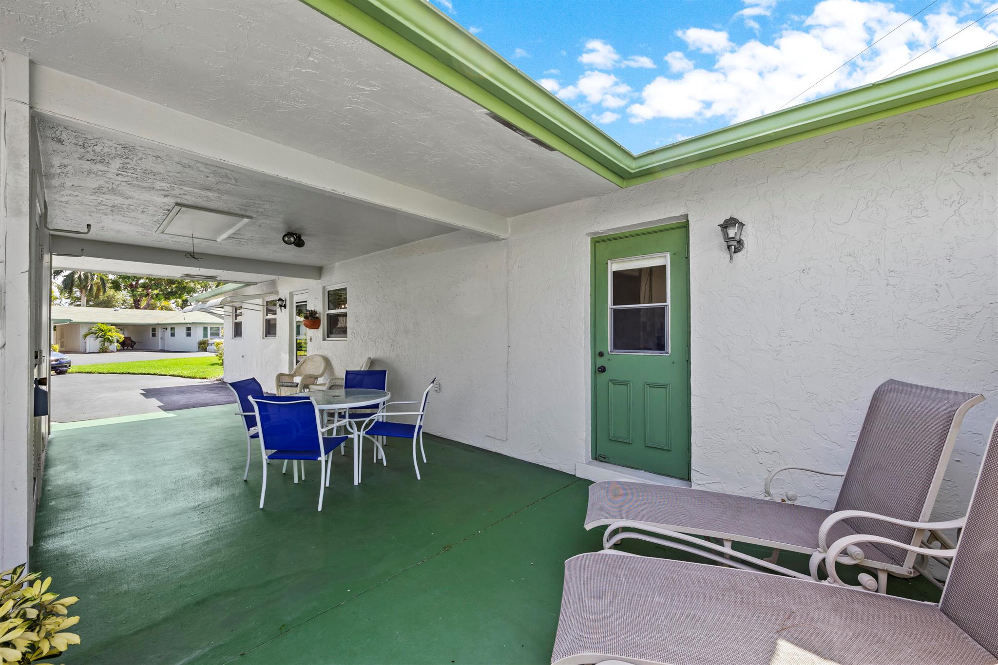 HURRICANE IMPACT WINDOWS! Wood Parquet floors thru out Villa, one bedroom has carpet, Villa is light and bright with upgraded plantation shutters in all rooms, kitchen with newer appliances, both the bathrooms are updated and includes tile floors, extra living space can be used as 3 bedroom or office, walk in closet in primary bedroom, Newer A/C/HVAC and Newer Water Heater, separate laundry room and storage area, covered carport and long driveway, water and basic cable included in low monthly association! Community has 9 Heated Pools, main clubhouse offers many social activities,