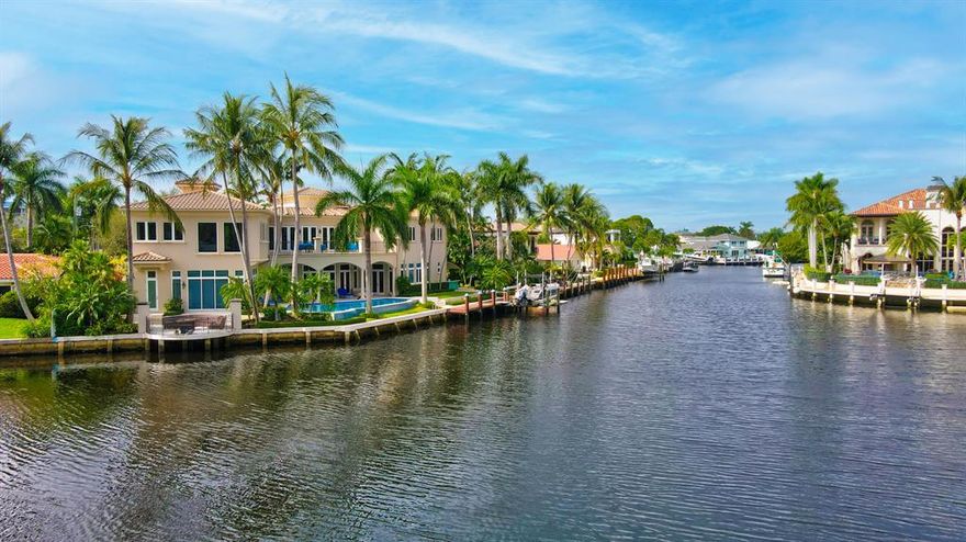 DOCK YOUR 100+ft YACHT!!! Be prepared to be wowed!  The minute you enter this magnificent estate you will be mesmerized by the incredible water views.  Designed for entertaining with classic design and complete privacy, this home offers a lifestyle that many desire while only a few can attain. Elegantly crafted with fine finishes and furnishings, this 4 bedroom, 2 offices, 6.1 bath, 5770 adj sq ft (5177 s f under air) residence is situated on a prime lot with serene views of Capone Island and protected dockage for a mega yacht.
Special features include: impact windows and doors, elevator, security system, central vacuum, heated saltwater pool, generator.
Excluded from purchase: furniture, large Italian chandelier in the staircase, all art, collectibles and sports memorabilia, piano, boat