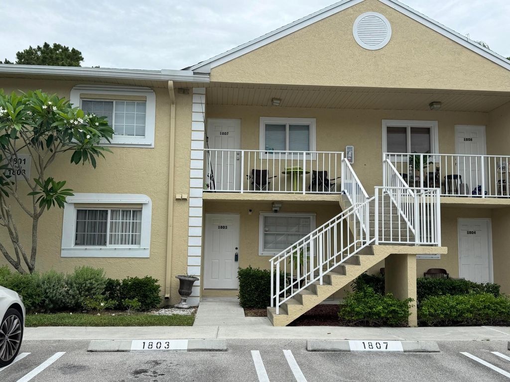 Photo of 1803 Palm Beach Trace Drive, Royal Palm Beach, FL 33411 (MLS # B26034985)