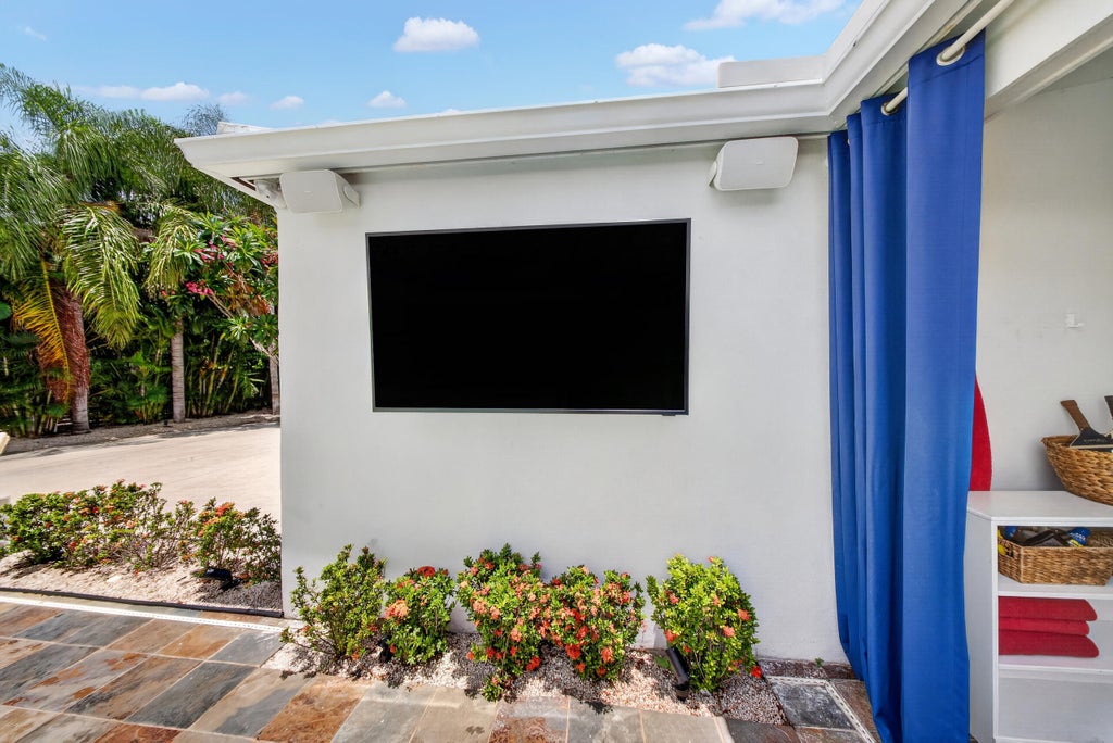 Photo of 714 S ATLANTIC Drive, Lantana, FL 33462 (MLS # B26061347)