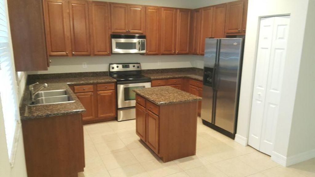 Photo of 1052 NW 18th Avenue, Boca Raton, FL 33486 (MLS # R11110964)