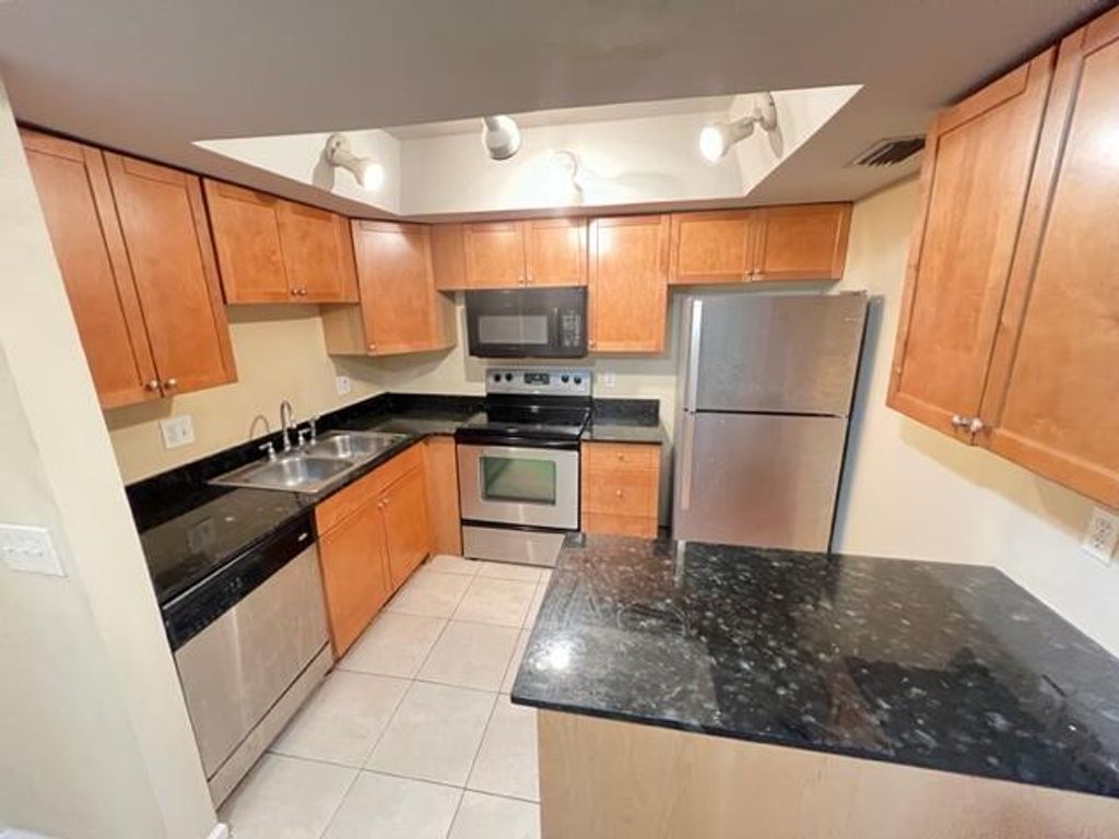 Photo of 4221 Oak Terrace Drive, Greenacres, FL 33463 (MLS # B26025186)