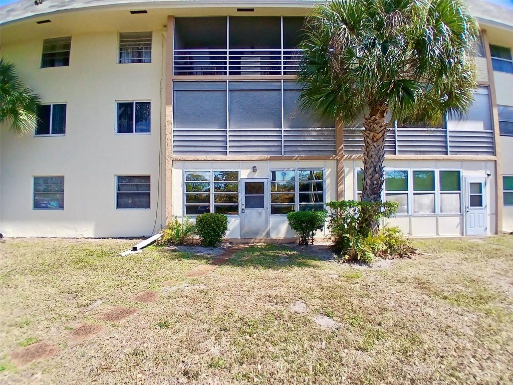Photo of 5190 E Sabal Palm Boulevard #103, Tamarac, FL 33319 (MLS # F10554849)