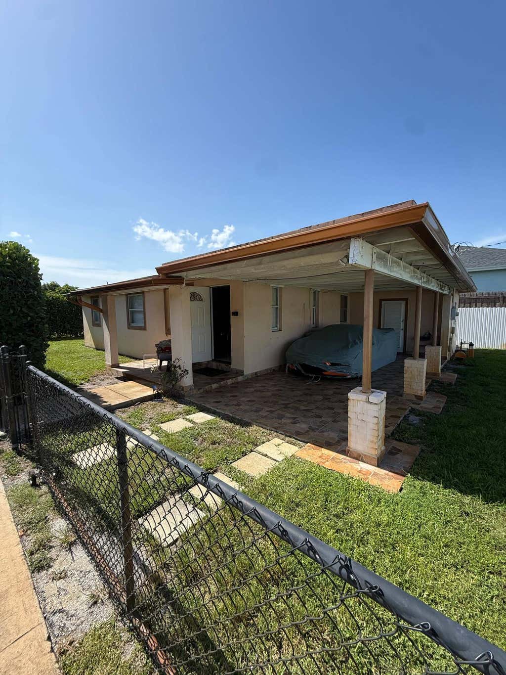 Photo of 302 WALKER Avenue, Greenacres, FL 33463 (MLS # B26065694)