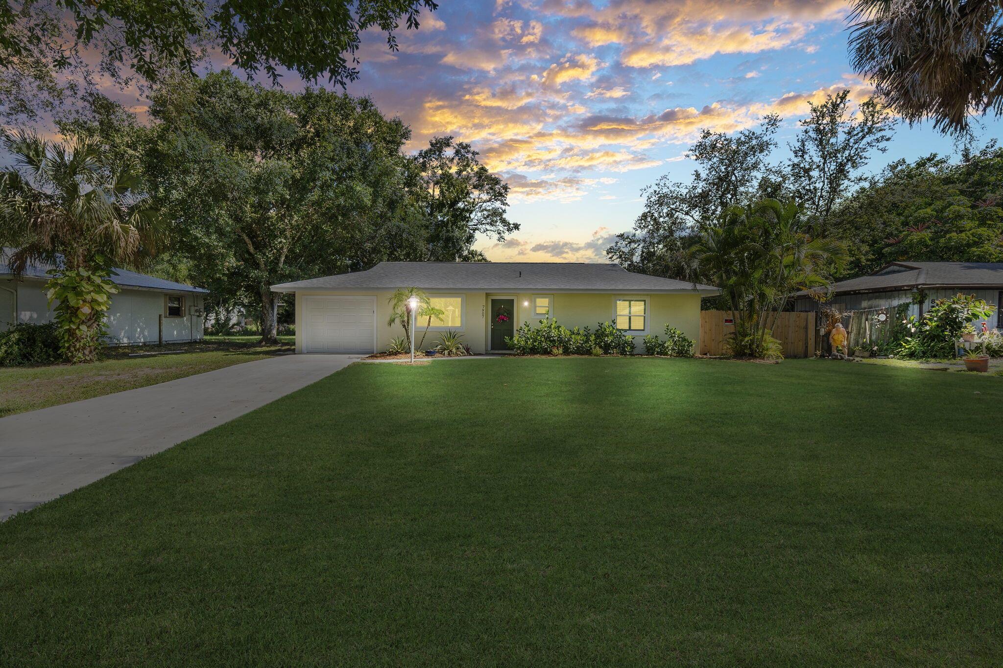 We 𝘤𝘰𝘶𝘭𝘥 say this home is ''stunning'' and ''boasts'' a ''chef's kitchen,'' but let's skip the buzzwords! This 2-bed, 2-bath ranch in Lakewood Park is clean, updated, and refreshingly unrestricted. Set on a .29-acre lot with mature trees for shade and privacy, this fenced backyard is ready for your chickens, RV, boat, etc.! Granite kitchen counters? Yep. Remodeled baths? You bet! One even has a jacuzzi tub. New chevron flooring, new impact windows, 2022 roof, 2018 HVAC with fancy filters, and crown molding for bonus charm! There's a wide 10' side gate, an extra-long driveway, and no HOA rules breathing down your neck. Just a friendly $6.25/month to help maintain Village Hall and parks, and the area's 25 lakes!
