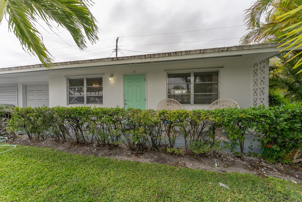 Photo of 722 Ridge Road, Lantana, FL 33462 (MLS # B26003803)