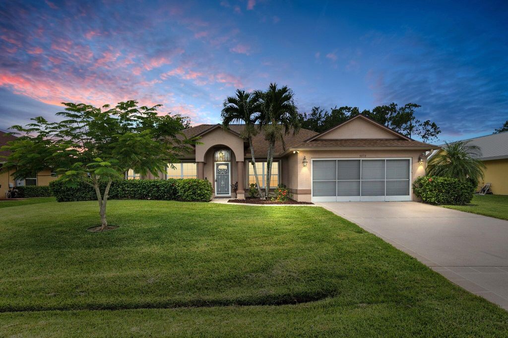 Photo of 5878 NW Corso Avenue, Port St Lucie, FL 34986 (MLS # R10896620)