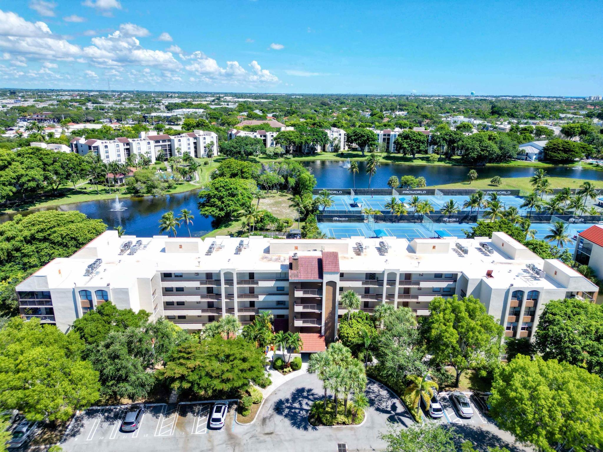 Winter is coming... why not spend it under the South Florida sun? Welcome to your perfect seasonal getaway in beautiful Delray Beach. This updated 2-bedroom, 2-bath corner condo is one of the larger units in the community with approximately 1,400 sq. ft. of living space. Turnkey, fully furnished, and move-in ready.Highlights include:Gorgeous wraparound patio with expansive lake views, ideal for morning coffee or sunset relaxationComplete hurricane-impact windows and doors, including sliding doors, that fill the home with natural lightSpacious interior with extra square footage and a large laundry room with washer and dryer inside the unitElegant finishes: all-tile flooring (no carpet), recessed lighting, and a jacuzzi tub in the guest bath.