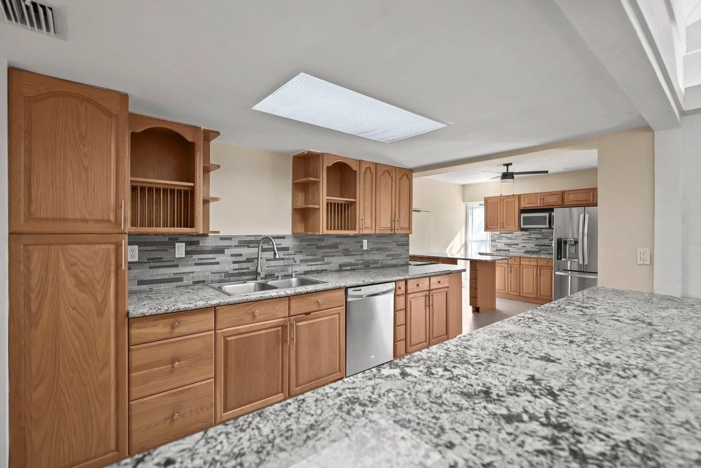 Photo of 6104 White Oak Lane, Tamarac, FL 33319 (MLS # F10544386)