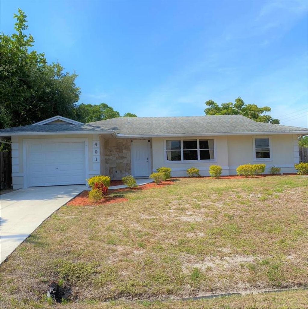 Photo of 401 SW David Terrace, Port Saint Lucie, FL 34953 (MLS # R10703185)