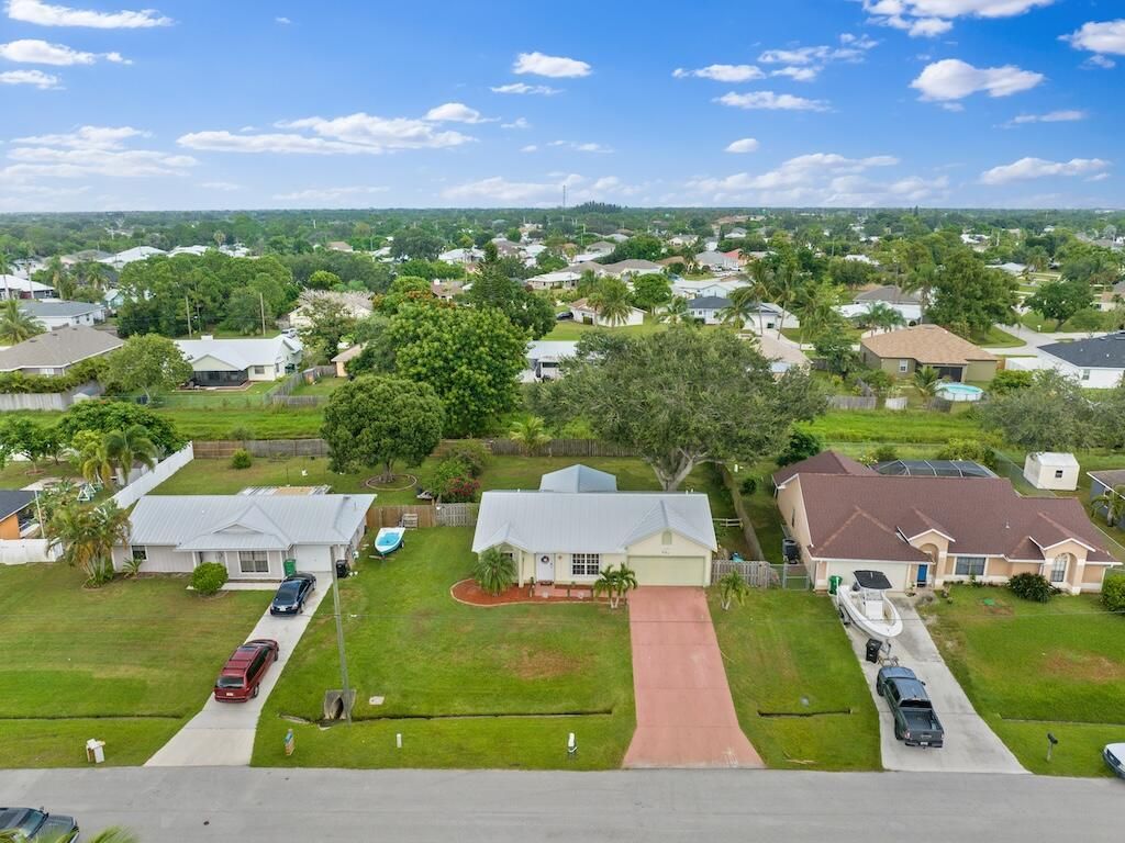 Photo of 581 SW Dairy Road, Port Saint Lucie, FL 34953 (MLS # R11113943)