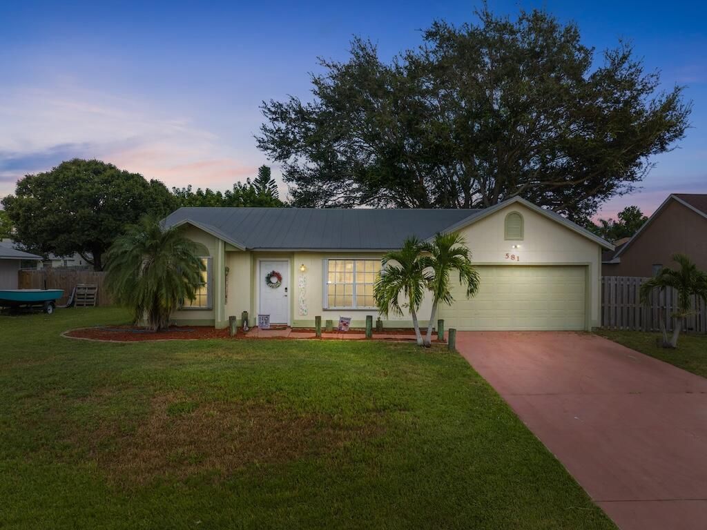 Photo of 581 SW Dairy Road, Port Saint Lucie, FL 34953 (MLS # R11113943)