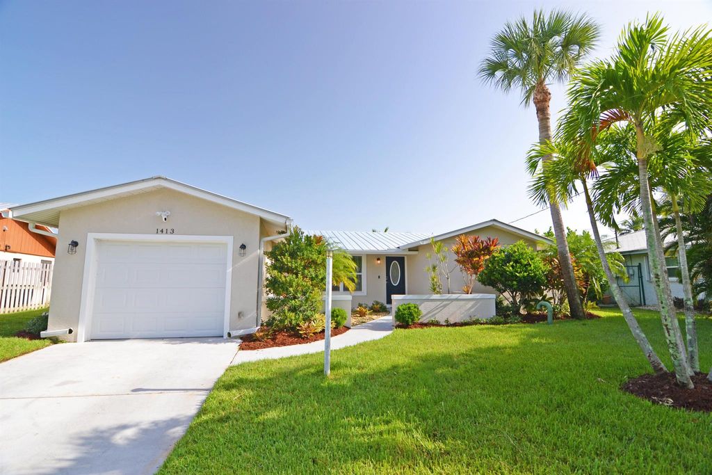Photo of 1413 SW Seagull Way, Palm City, FL 34990 (MLS # R10907909)