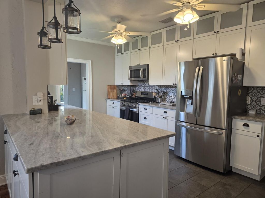 Photo of 6307 Garden Avenue, West Palm Beach, FL 33405 (MLS # R11130103)