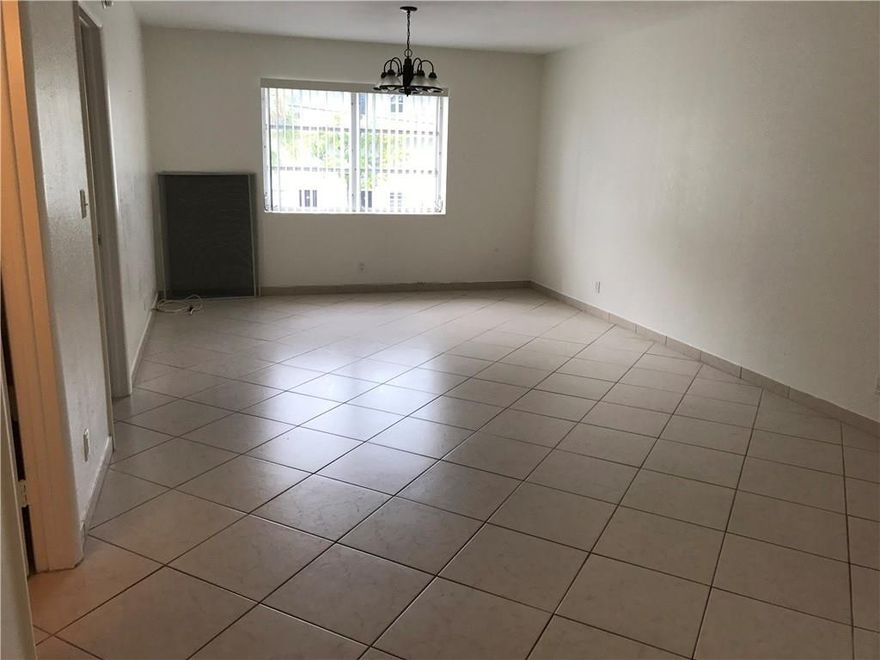 Spacious 1/1 all ceramic tile floors, updated kitchen, bedroom walk in closet.   Well maintained tropical setting with over-sized community pool.  On bus line and walking distance to shopping and Wilton Manors Drive.  Over 55+ community.  No pets allowed, no smoking in unit.