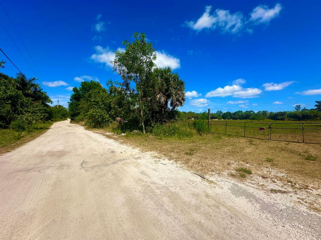 Photo of 4088 Windmill Road, The Acreage, FL 33470 (MLS # R10979986)