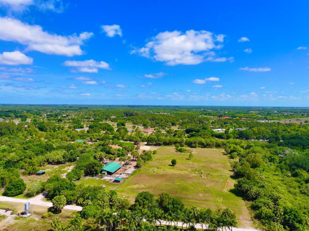 Photo of 4088 Windmill Road, The Acreage, FL 33470 (MLS # R10979986)