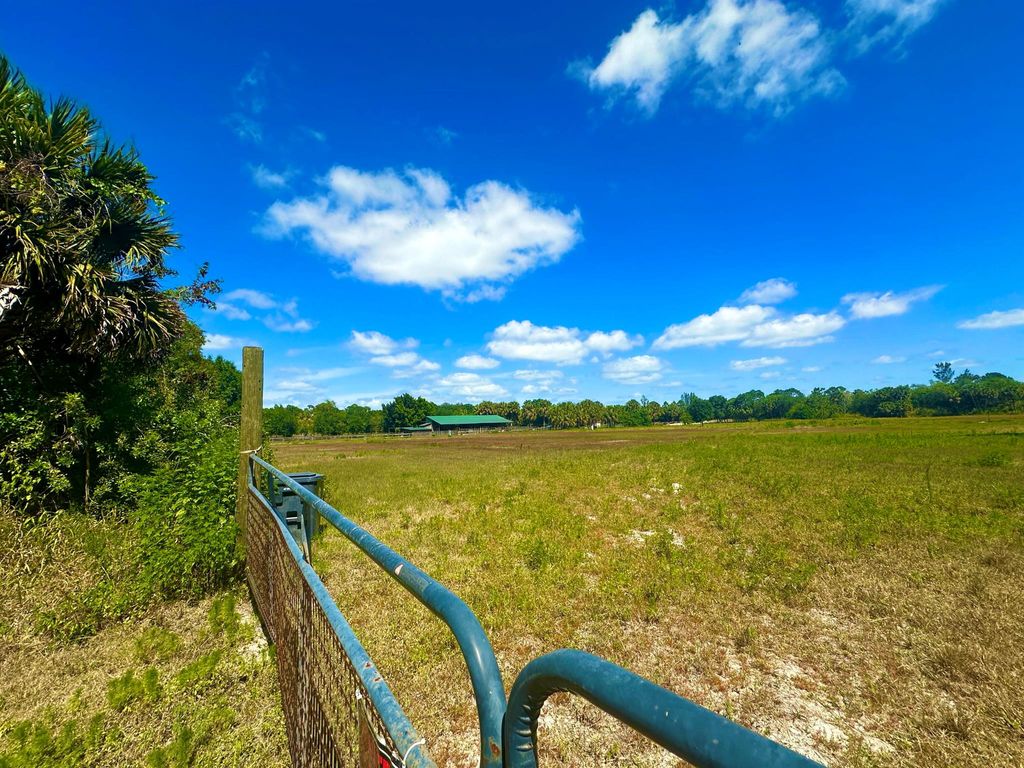 Photo of 4088 Windmill Road, The Acreage, FL 33470 (MLS # R10979986)