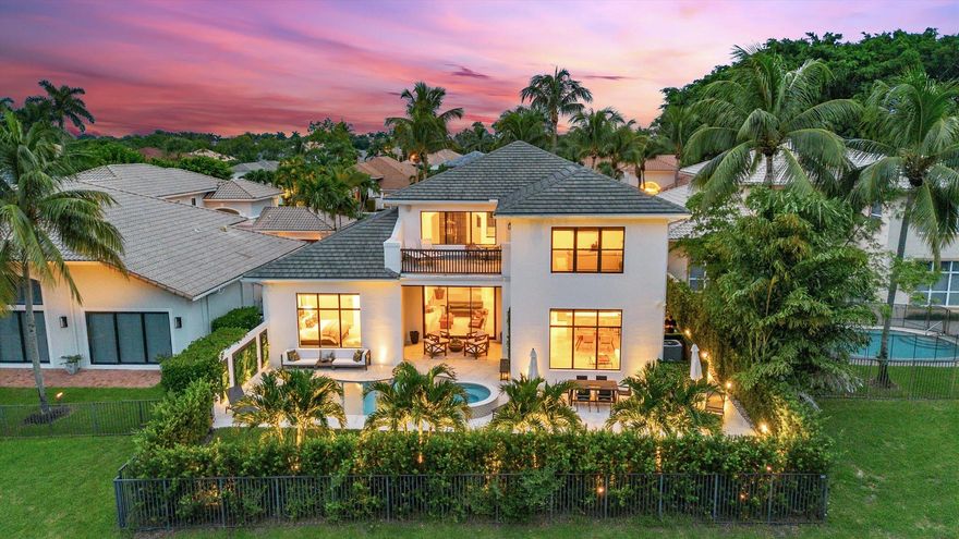 Stunning, renovated home on one of the premier lots in Bent Cypress, offering water, and sunset views with total privacy and low-maintenance living. Enjoy the newly updated outdoor patio and pool--perfect for relaxing or entertaining--without the upkeep of a large yard. Inside, soaring 30-ft ceilings welcome you to a beautifully furnished space featuring travertine and marble finishes, a formal living room with wet bar and wine cooler, and a custom granite kitchen. Modern comfort meets effortless style in this 2003-built gem.