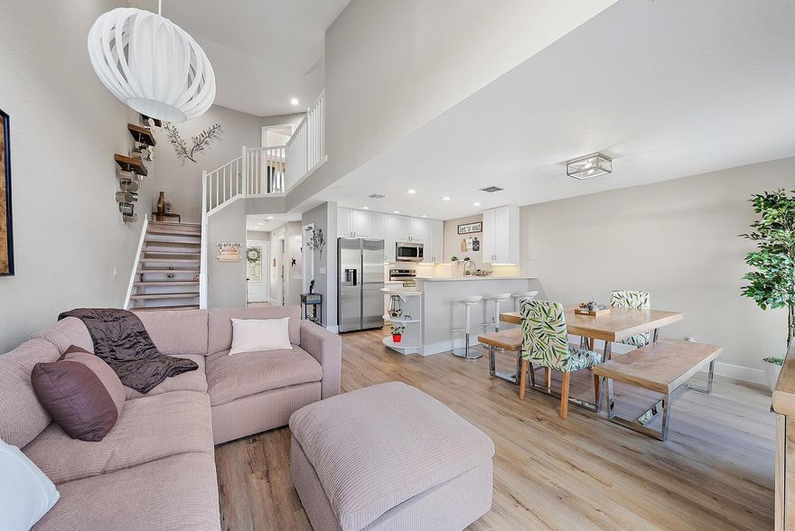 Welcome to Westwood Lakes, a quaint townhome community in Palm Beach Gardens. This 3-bedroom, 3-bathroom townhome shows brand NEW! Recent updates include: impact windows, luxury vinyl flooring throughout, fresh paint, new baseboards, new water heater, new fans and lights, new primary bathroom vanity, new kitchen appliances, new kitchen faucet, new washer and dryer, new turf and polypropylene drainage on the front porch, and new pavers on the back patio. Centrally located to I-95 and convenient to all things Palm Beach Gardens, including Alton Town Center, the Gardens Mall, Carmines Deli and only a short 10 minute drive to the beach. Enjoy A-rated schools in this pet friendly community, which includes three community pools, tennis and basketball courts, and a children's playground. In addition, the low monthly HOA fee includes cable, high-speed internet and landscaping. Westwood Gardens is a highly sought-after community; come and get it before it's gone!