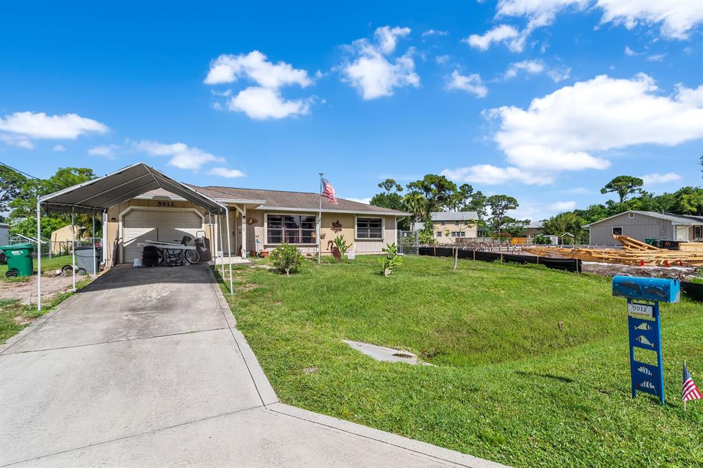 Photo of 5912 Cassia Drive Dr, Fort Pierce, FL 34982 (MLS # R10815152)