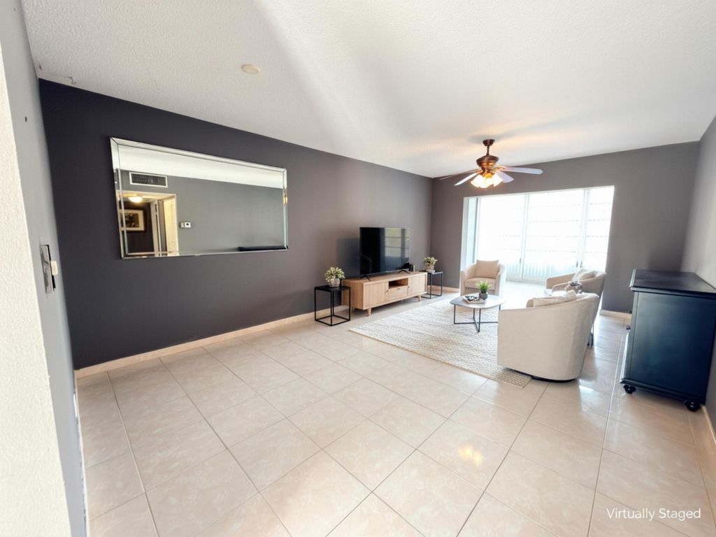 Photo of 5041 W Oakland Park Boulevard #111, Lauderdale Lakes, FL 33313 (MLS # R11148144)