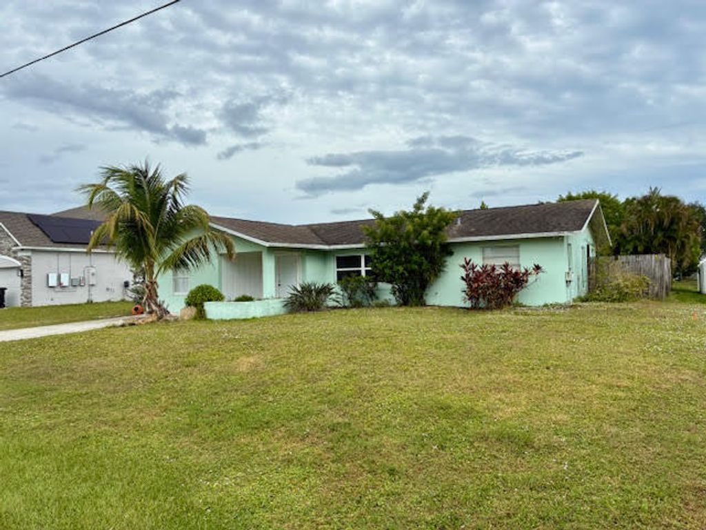Photo of 2351 SW Chestnut Lane, Port Saint Lucie, FL 34953 (MLS # R11138814)