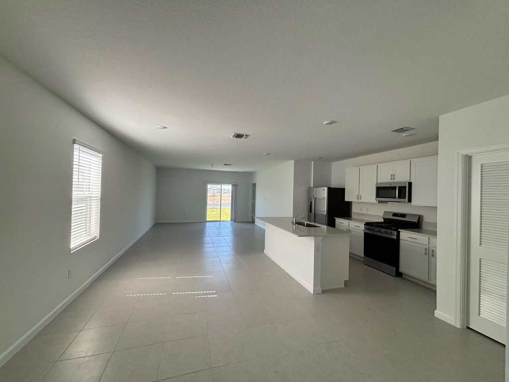 Photo of 5916 NW Sweetwood Drive, Port Saint Lucie, FL 34987 (MLS # R11159662)