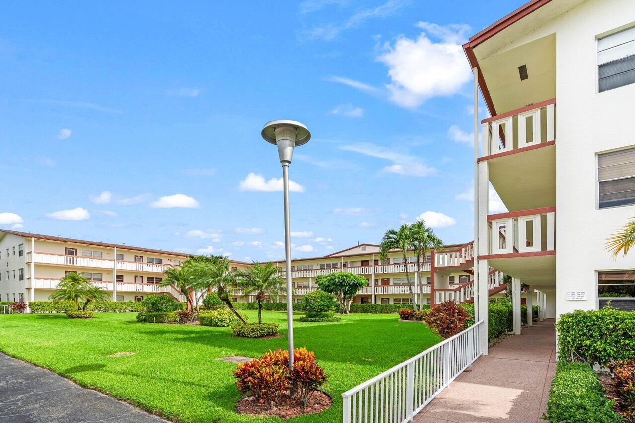 Discover an exceptional retirement lifestyle in the heart of Century Village, Boca Raton. This second-floor, one-bedroom, one bath open-concept unit with a screened back patio and a stunning lake view is a gateway to a world of year-round entertainment and leisure. This unit offers more than just a place to live; Within the Century Village complex, residents ages 55+ enjoy a wealth of offerings. You'll have easy access to the community theater, where current movies and live entertainment take center stage. Here, you can immerse yourself in captivating performances, laugh along with comedians, and tap your feet to the rhythm of live music. This one-bedroom unit is the key to a lifestyle filled with everything you've always dreamed of!