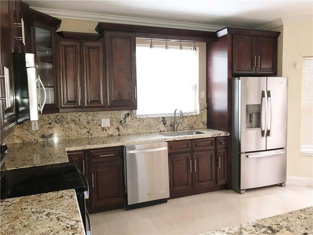 Photo of 1295 WEEPING WILLOW Way #1295, Hollywood, FL 33019 (MLS # B26060798)