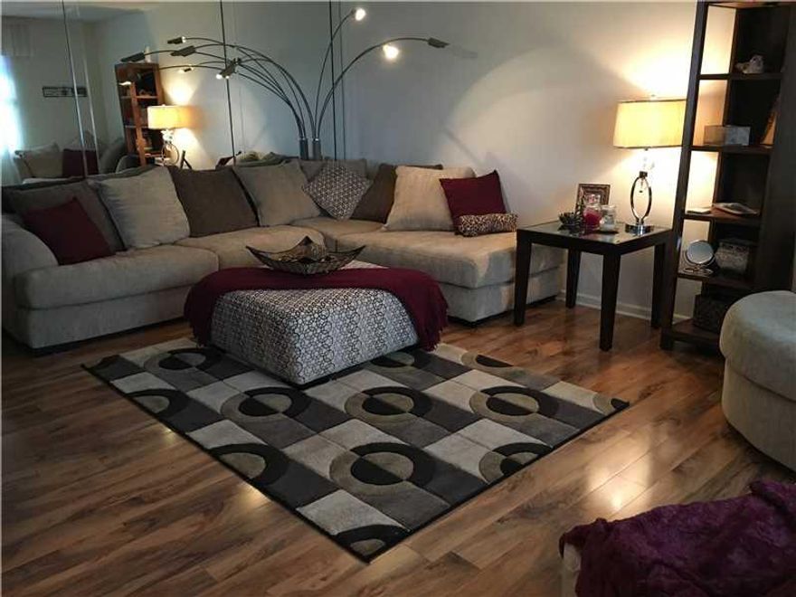 INVEST IN EXCELLENCE....A TURNKEY, PROFESSIONALLY & METICULOUSLY RENOVATED CORNER OVERLOOKING AN EXPANSIVE, PRIVATE GREEN SPACE.   LEGALLY PERMITTED IMPACT WINDOWS ON ALL WINDOWS INCLUDING PATIO WINDOWS & ITS INSULATED WALL BELOW. CONDO FEATURES: MODERN F URNITURE, BIG SCREEN TVS, REMOLDED KITCHEN WITH STAINLESS APPLIANCES, LAMINATED FLOORING, CERAMIC PATIO FLOOR, SOFT RALPH LAUREN COLORS THROUGHOUT, NEWER A/C AND WATER HEATER, 4 MILES TO BEACH, 55+