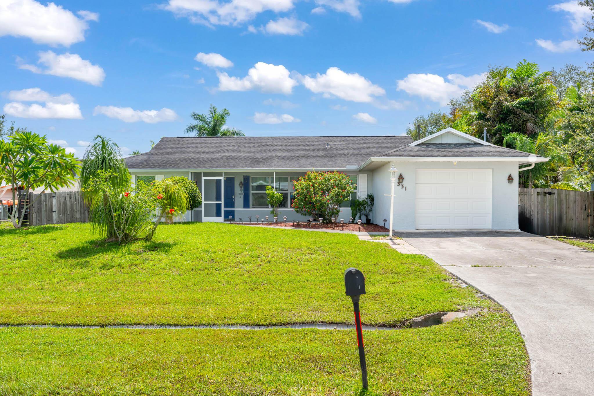 Welcome to 331 NW Dearman Street, this beautiful 3/2/1 home offers a split floor plan, tile flooring, new updated kitchen 2018, updated plumbing, new screening, full impact windows, garage door, and patio sliders, new circuit breaker, electric garage door, kitchen island, roof 2018, A/C 2019, Water Heater 2017.The seller has meticulously maintained this beautiful home, schedule your showing today!