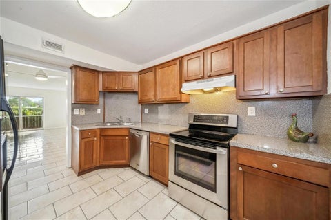 Tiny photo for 3475 Broken Woods Drive #102, Coral Springs, FL 33065 (MLS # B26006934)