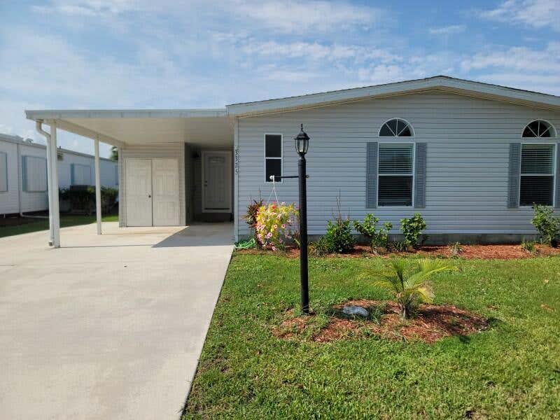 Photo of 3325 Ironwood Avenue, Port Saint Lucie, FL 34952 (MLS # B26062213)