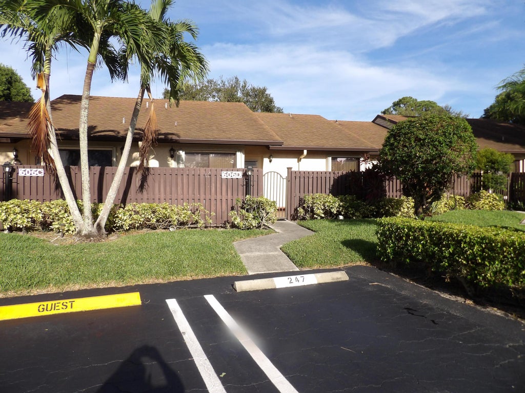 Photo of 606 Sea Pine Way #D, Greenacres, FL 33415 (MLS # B26061283)