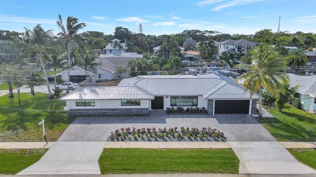 Photo of 604 Kingfish Road, North Palm Beach, FL 33408 (MLS # R10862785)