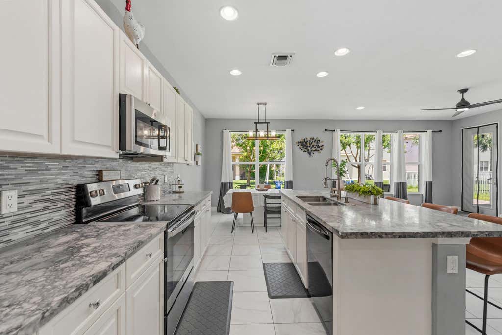 Photo of 1327 NW Leonardo Circle, Port Saint Lucie, FL 34986 (MLS # B26046607)