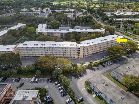 Photo of 6731 Cypress Road #402, Plantation, FL 33317 (MLS # B26000600)