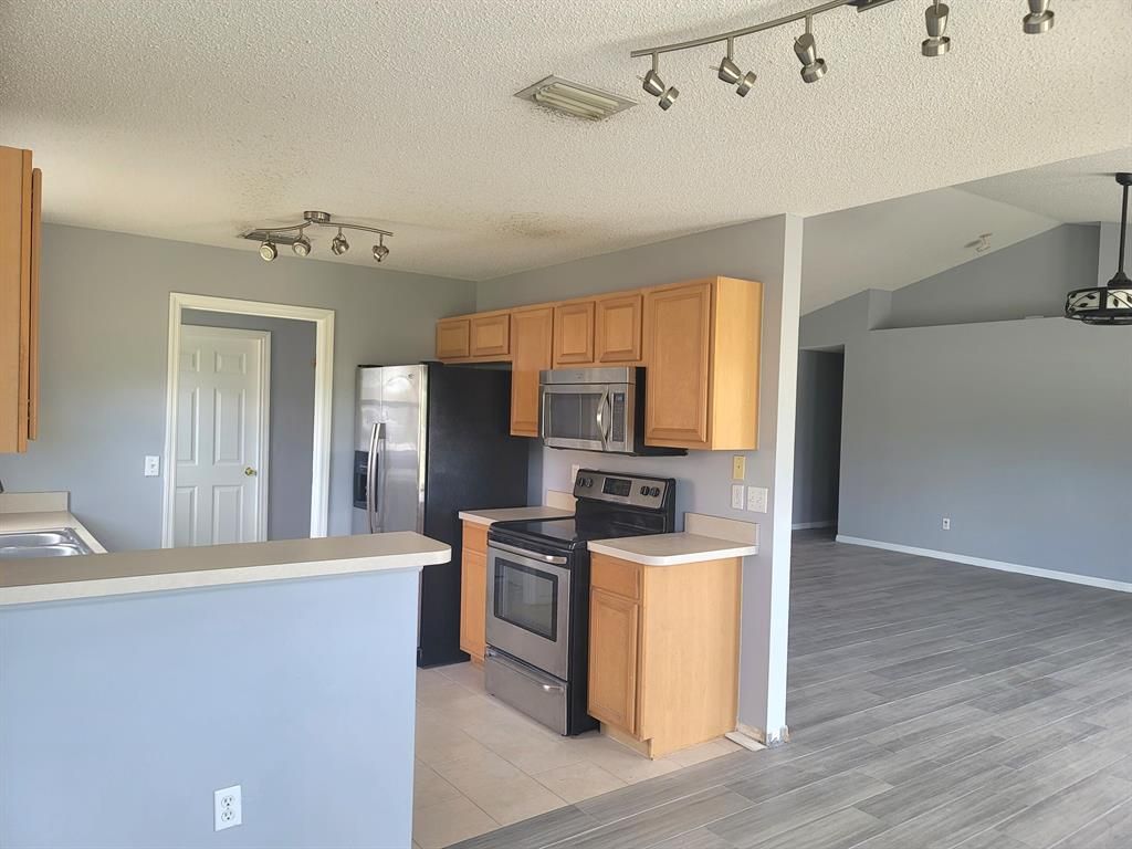 Photo of 1941 SW Hampshire Lane, Port Saint Lucie, FL 34953 (MLS # R10794277)