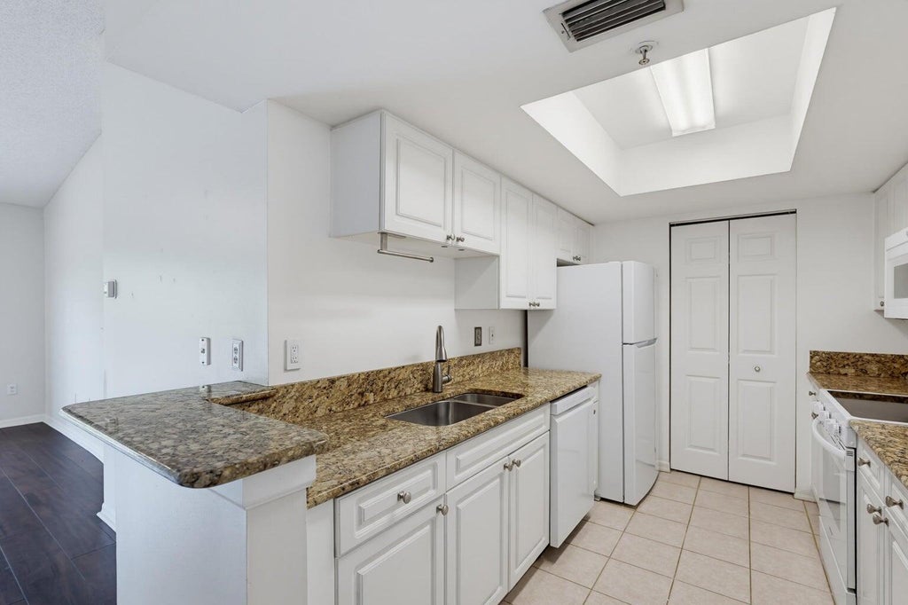 Photo of 400 CRESTWOOD Court N #417, Royal Palm Beach, FL 33411 (MLS # B26069806)