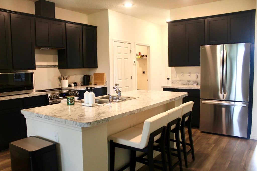 Photo of 3156 SW Ann Arbor Road, Port Saint Lucie, FL 34953 (MLS # R11020862)