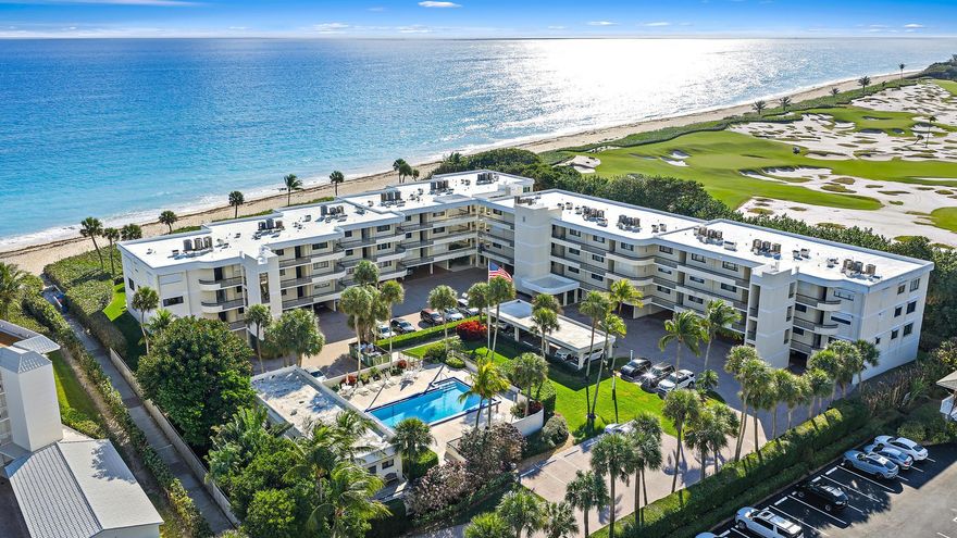 Enjoy luxury coastal living in this beautifully re-imagined three-bedroom, two-bath residence located within an exclusive 55+ beachfront community nestled between the Atlantic Ocean and the world-famous Seminole Golf Club. This stunning, move-in-ready condominium offers spacious living areas, refined finishes, and indirect ocean views from the private balcony.  Designed with quality and attention to detail, the home features custom wood cabinetry throughout and upgraded appliances. The thoughtfully updated interior showcases a sophisticated coastal aesthetic, while impact-resistant sliding glass doors fill the residence with natural light and provide added peace of mind.  The well-appointed kitchen and elegant wet bar feature custom shaker-style cabinetry, a built-in ice machine, and a wine refrigerator—perfect for entertaining. Additional highlights include a private one-car garage and a dedicated storage locker.  Residents enjoy private beach access, a community pool, and the relaxed ambiance of oceanfront living. Wake up to the sound of the waves and experience the tranquility of this exceptional coastal retreat.