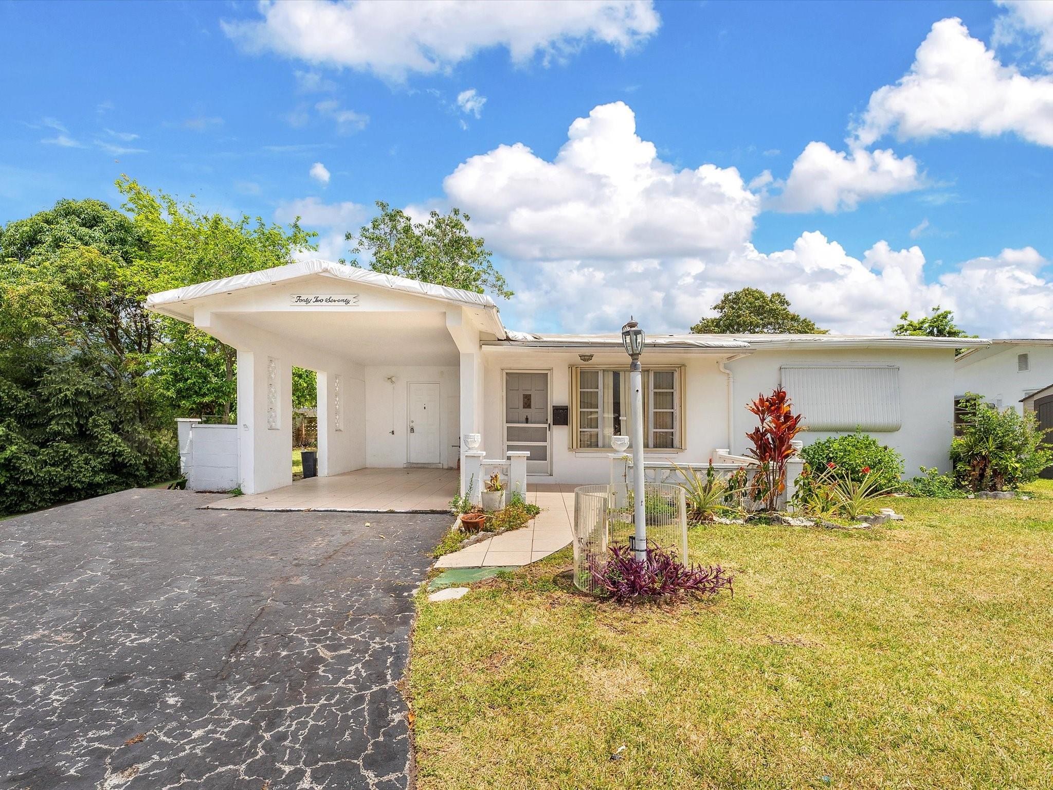 Investor Opportunity! Price Reflects Need for New Roof. Located in a desirable 55+ community in Lauderdale Lakes, this property at 4270 NW 49 Avenue presents a fantastic opportunity for investors. This is a cash only sale, and the price has been adjusted to reflect the need for a new roof. Enjoy the mature landscaping featuring lots of fruit trees. This is a prime chance to acquire a property in a sought-after 55+ setting at a price point that accounts for necessary renovations. Don't miss out on this investment special! HOA covers lawn, irrigation, and painting of the home 1 time every 5 years. HOA requires approval. Approval process takes 30 days per HOA. Minimum credit score of 625. One owner/occupant must be 55+ and all other occupants must be 18+.