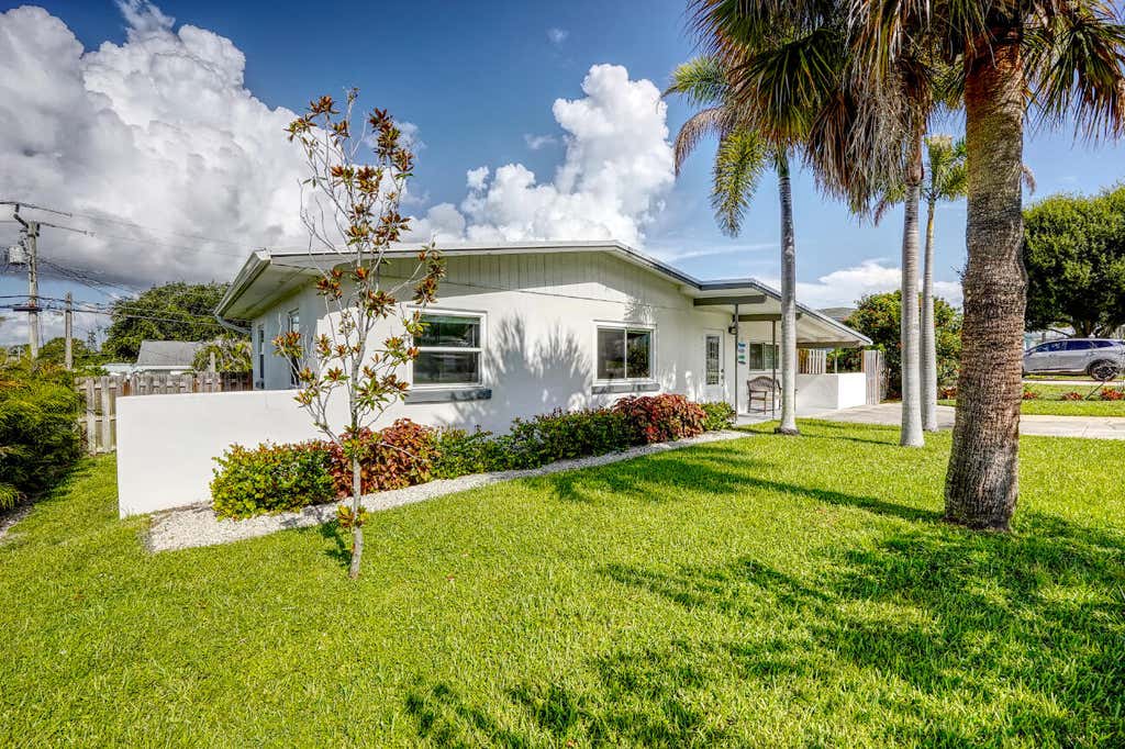 Photo of 3444 NE SANDRA Drive, Jensen Beach, FL 34957 (MLS # B26062935)
